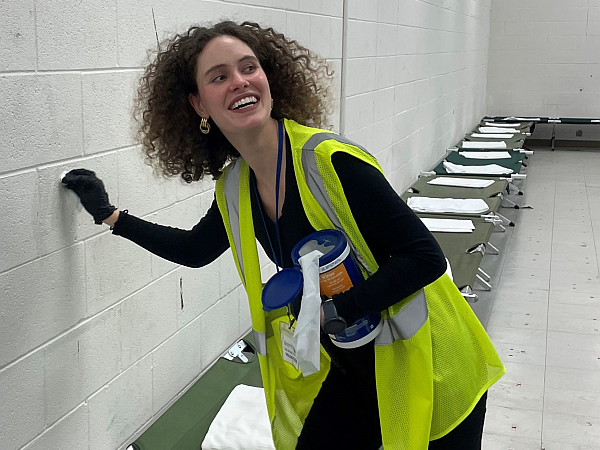 Holly volutneering at a community center